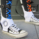 Illustration for article titled Giant emPortal/em Sneakers Help You Jump From Fashions Greatest Heights